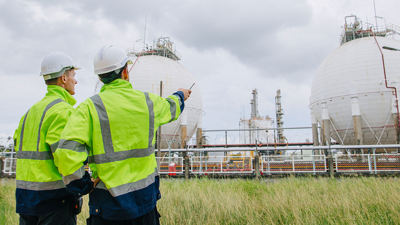 Field techs at an industrial site
