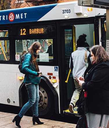 Riders boarding a TriMet bus