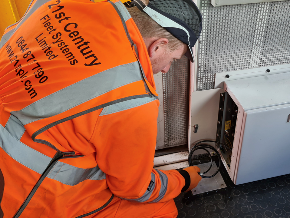 Fleet technician checking hardware